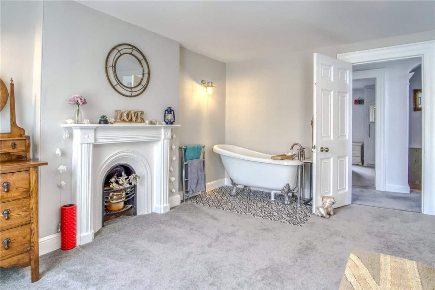 Freestanding bath and Georgian fireplace in the bridal suite