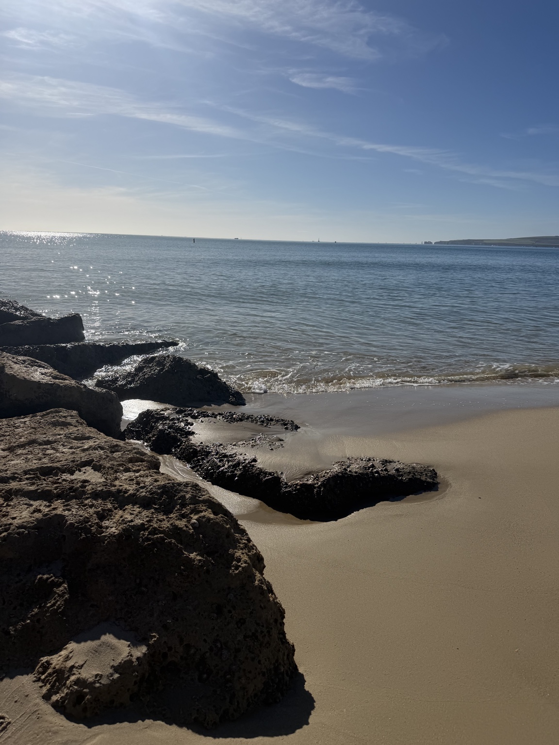 Sandbanks beach with rocks and clear sea